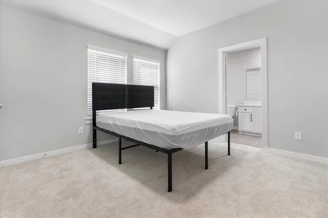 a view of a livingroom with furniture and window