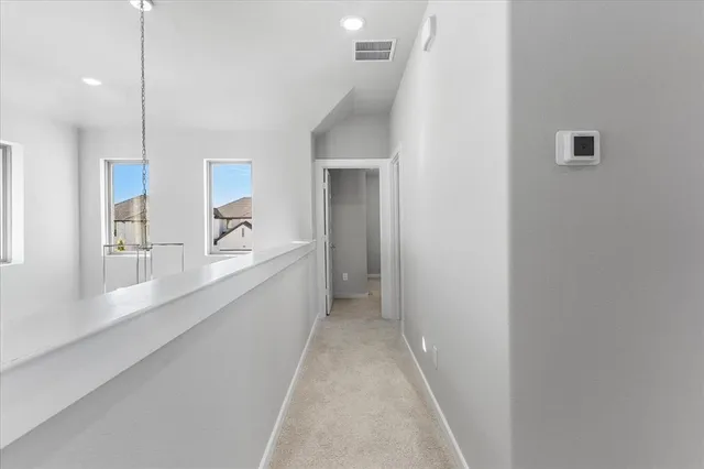 a view of hallway with window