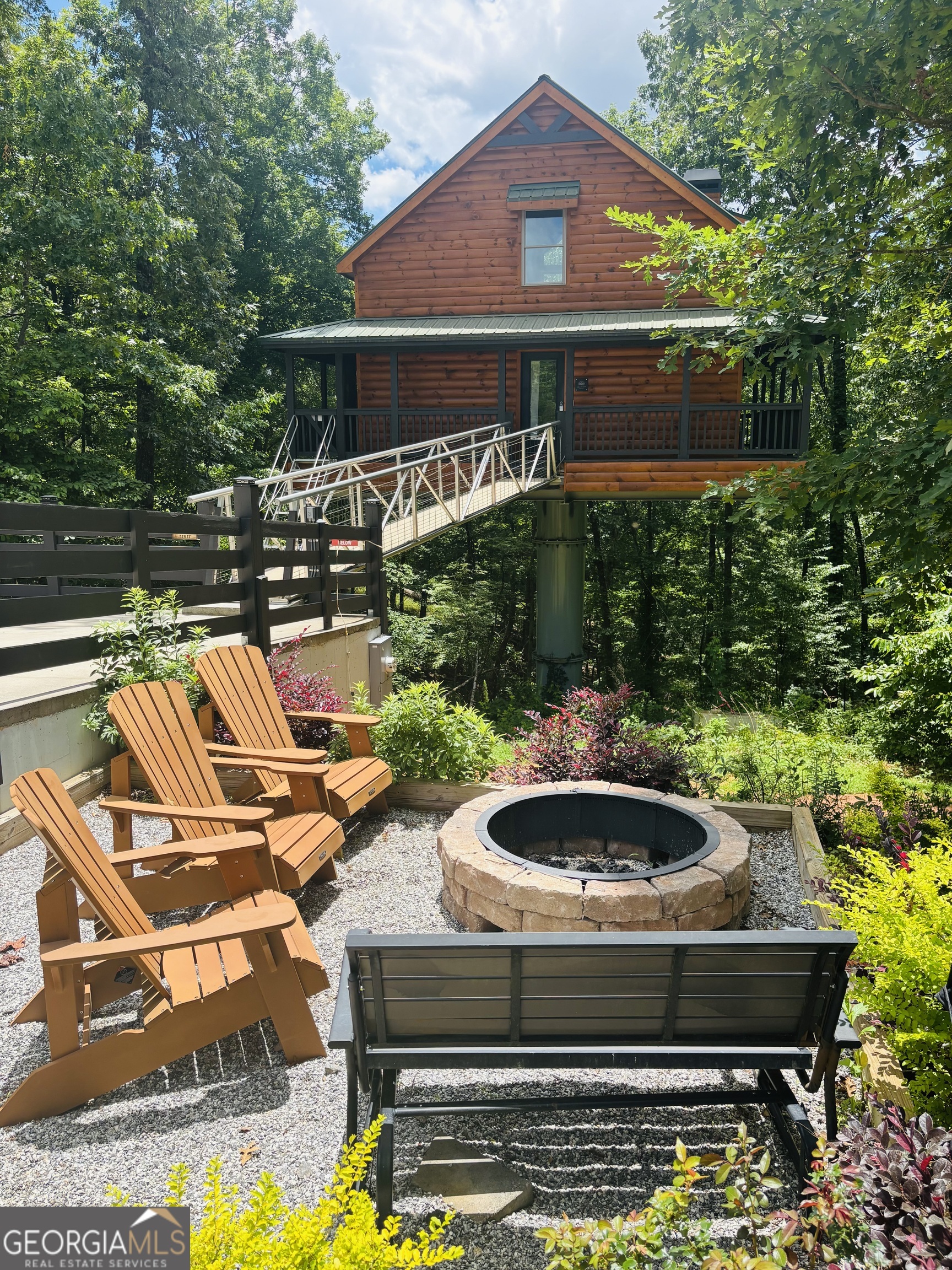 185 Walnut Ridge Drive Cleveland, GA 30528 - Photo 2 of 36 a view of a house with pool and chairs