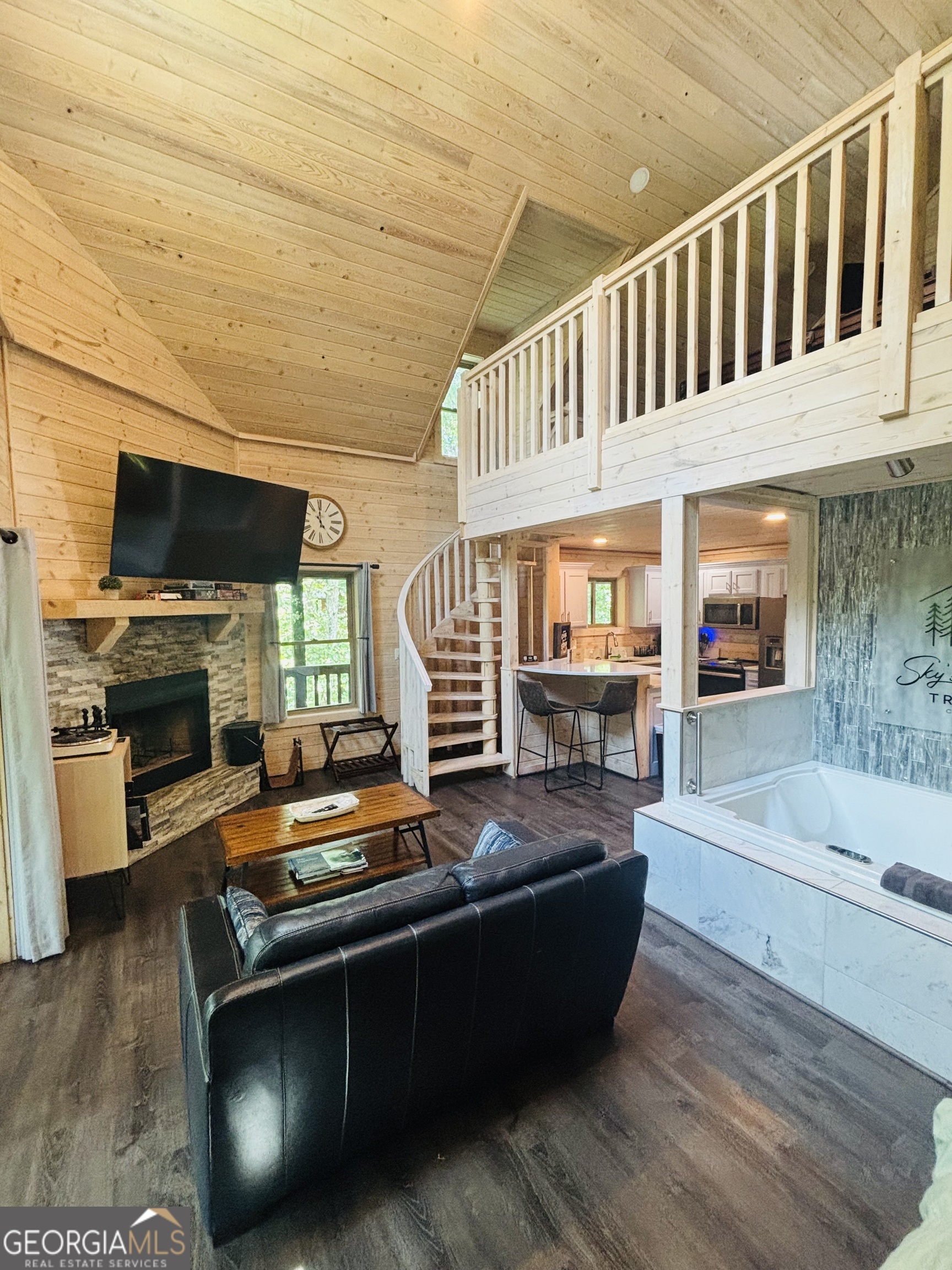 185 Walnut Ridge Drive Cleveland, GA 30528 - Photo 24 of 36 a living room with furniture and a flat screen tv