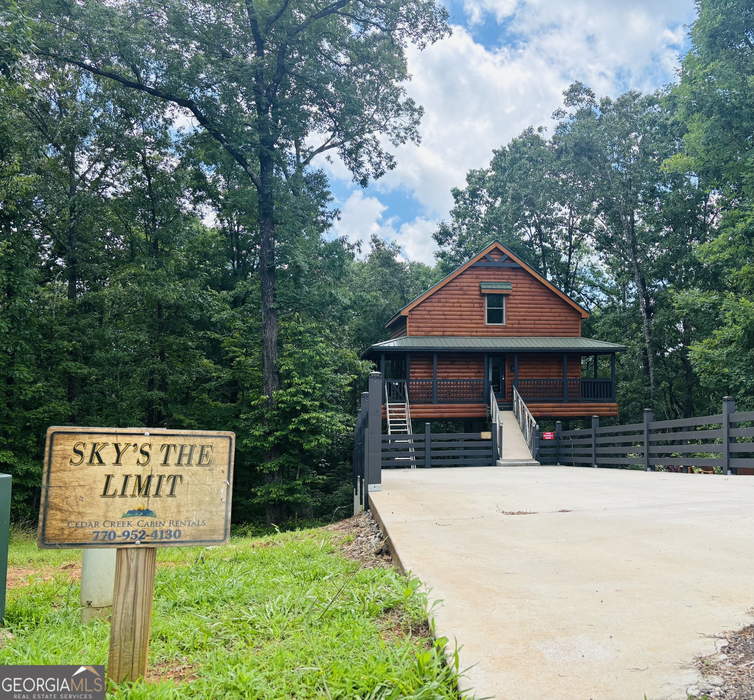 185 Walnut Ridge Drive Cleveland, GA 30528 - Photo 3 of 36 a view of house with sign board and yard