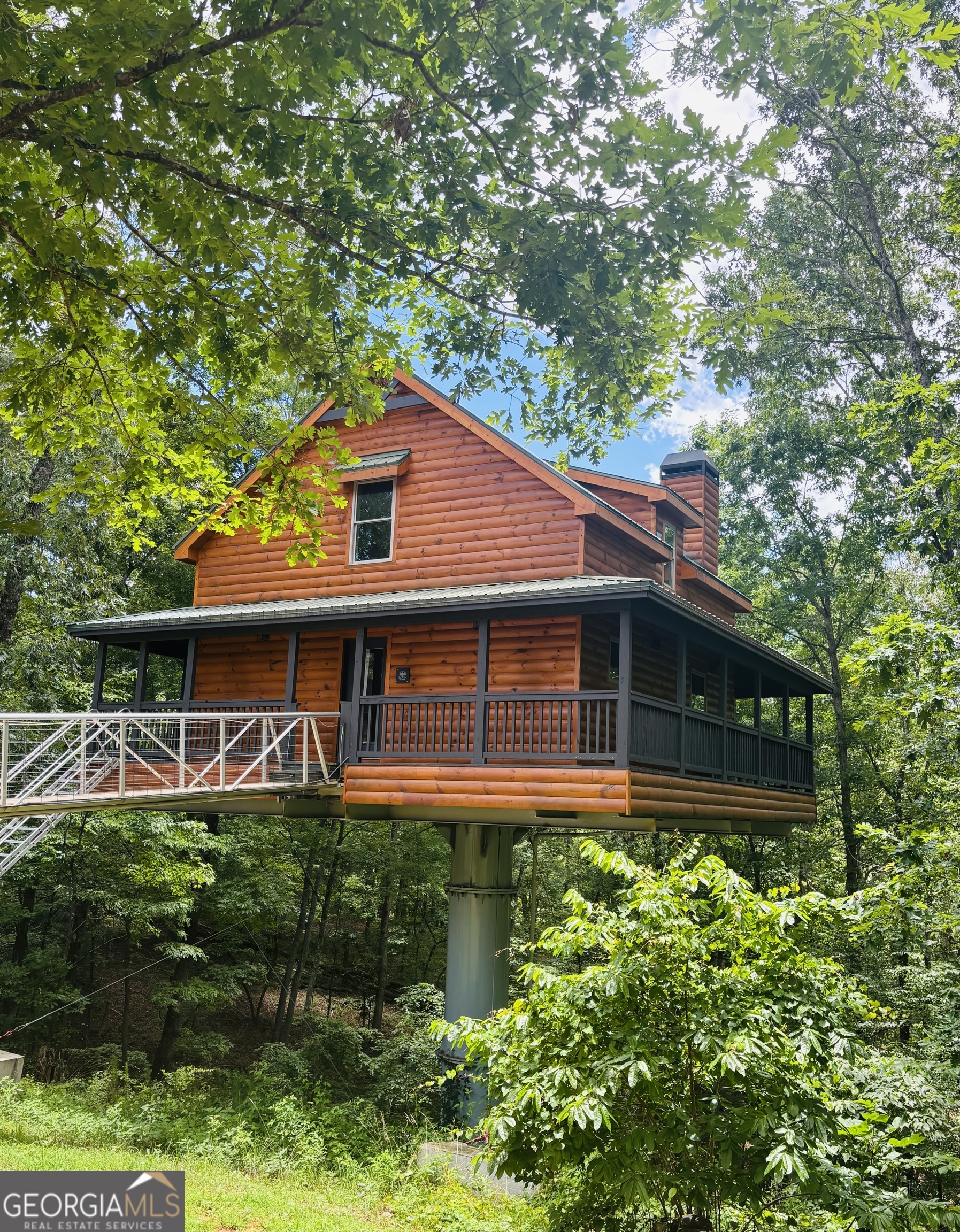 185 Walnut Ridge Drive Cleveland, GA 30528 - Photo 35 of 36 a front view of a house with a yard