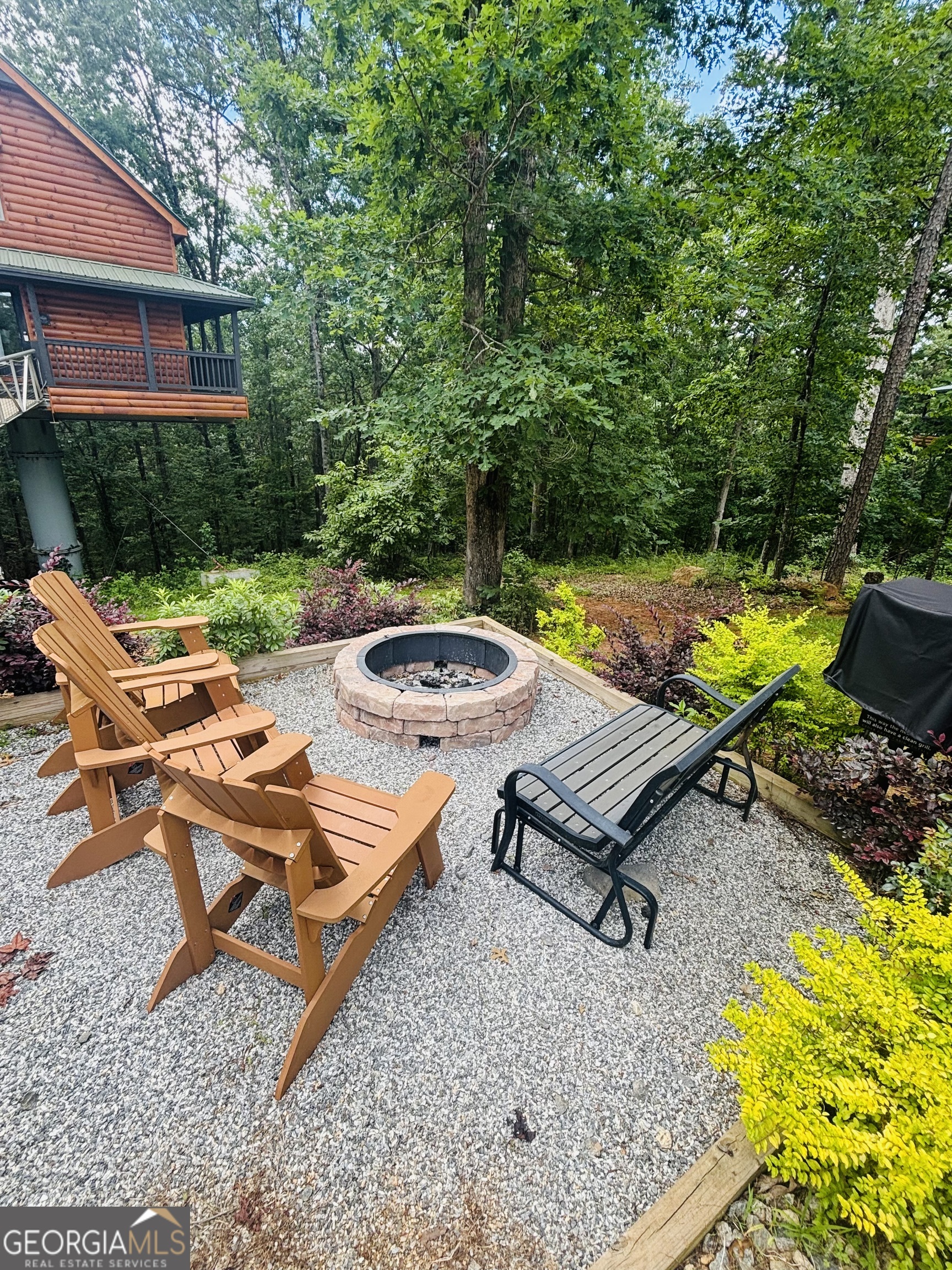 185 Walnut Ridge Drive Cleveland, GA 30528 - Photo 4 of 36 a view of a backyard with sitting area