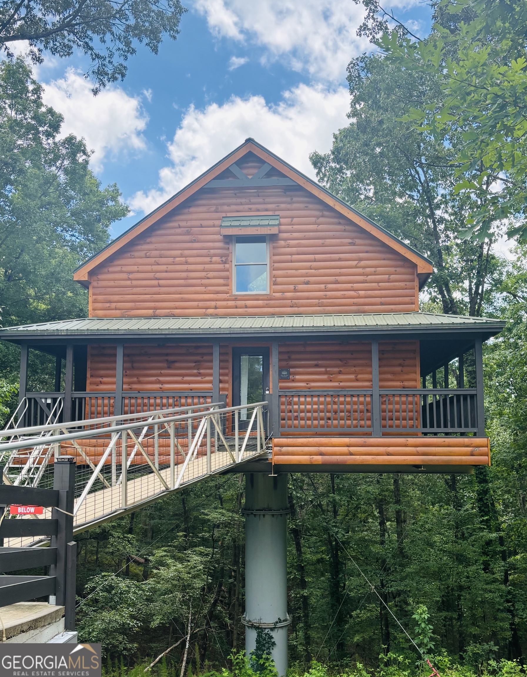 185 Walnut Ridge Drive Cleveland, GA 30528 - Photo 6 of 36 a front view of a house with a yard