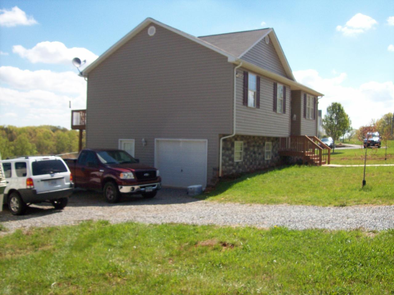 155 Northridge Road Hardy, VA 24101 - Photo 3 of 18 a view of a car in front of house