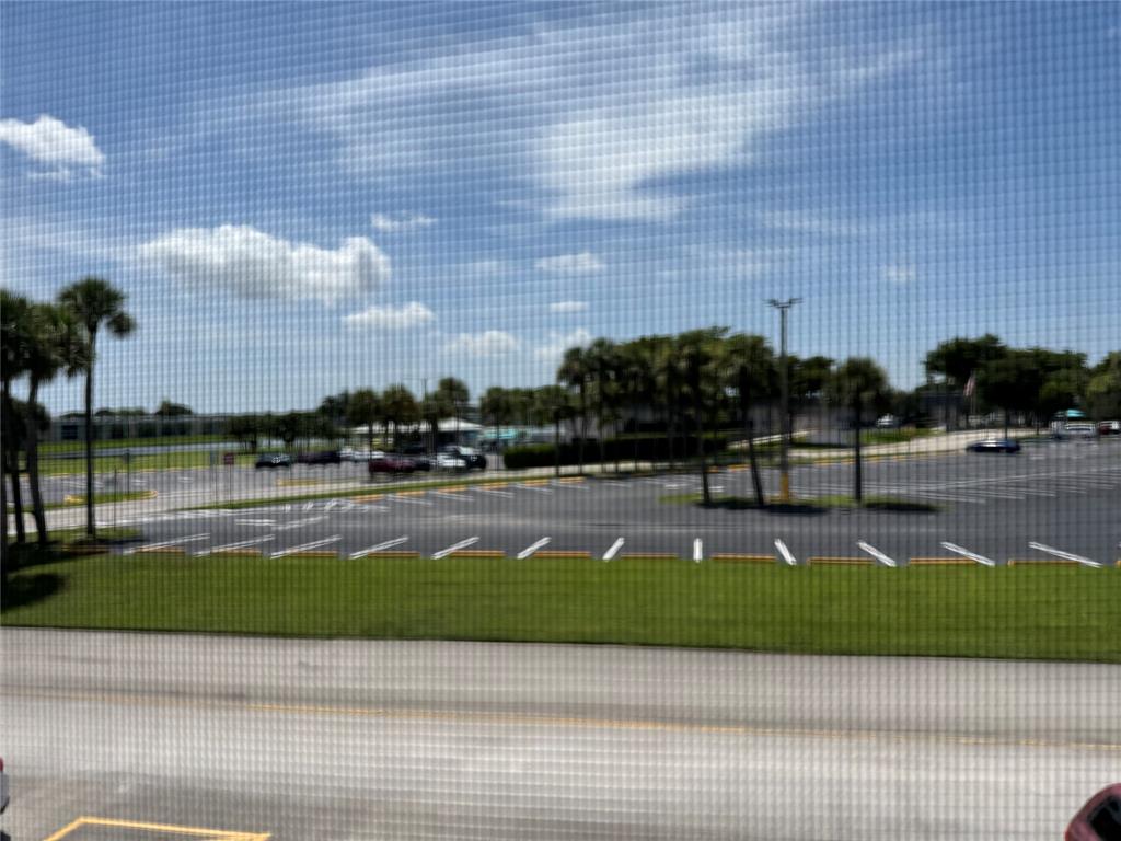 768 P Normandy, Unit 768 Delray Beach, FL 33484 - Photo 18 of 34 a view of a yard