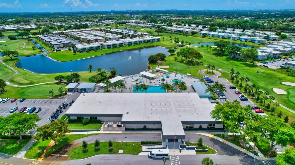 768 P Normandy, Unit 768 Delray Beach, FL 33484 - Photo 30 of 34 an aerial view of residential houses and outdoor space