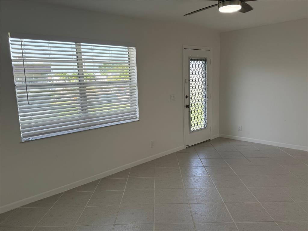 768 P Normandy, Unit 768 Delray Beach, FL 33484 - Photo 4 of 34 an empty room with windows
