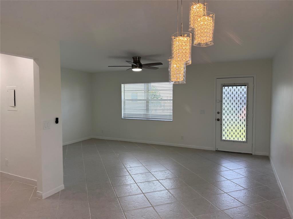 768 P Normandy, Unit 768 Delray Beach, FL 33484 - Photo 9 of 34 an empty room with windows