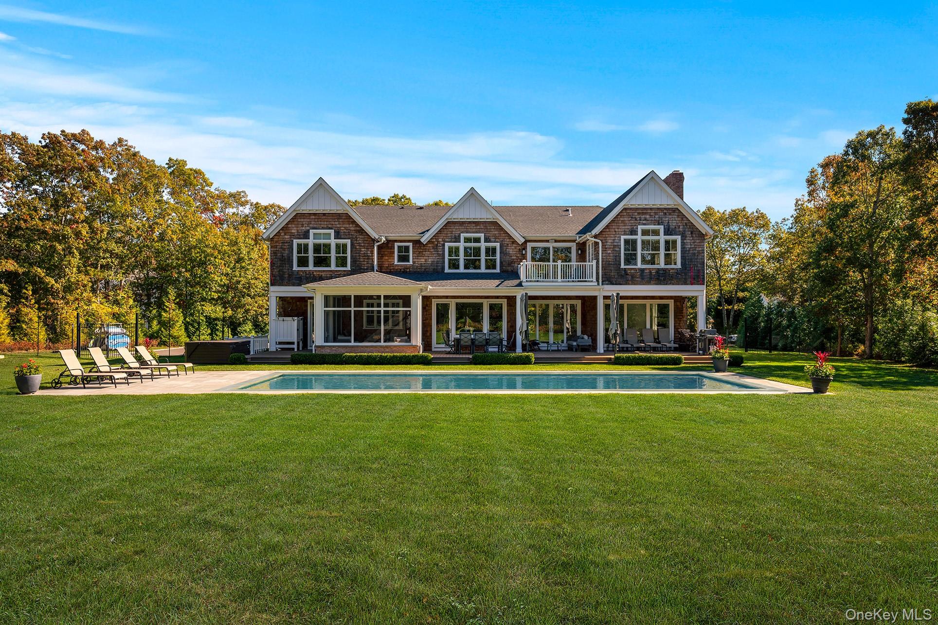 41 Arbutus Road Quogue, NY 11959 - Photo 4 of 35 Backyard, Pool and Patio