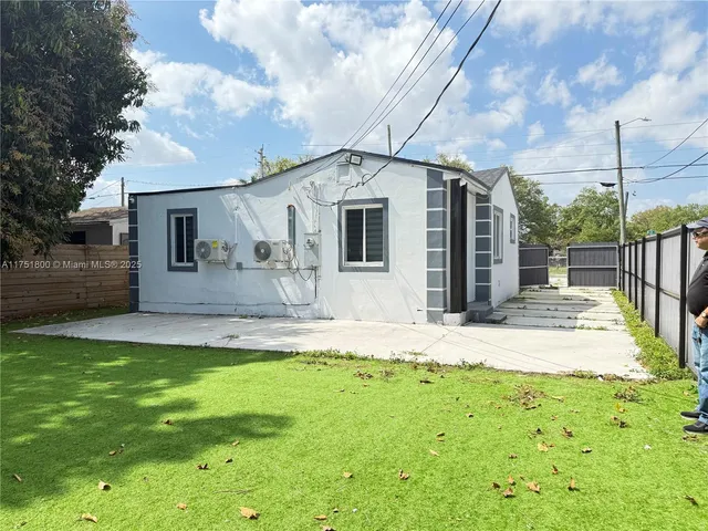 a house view with a garden space