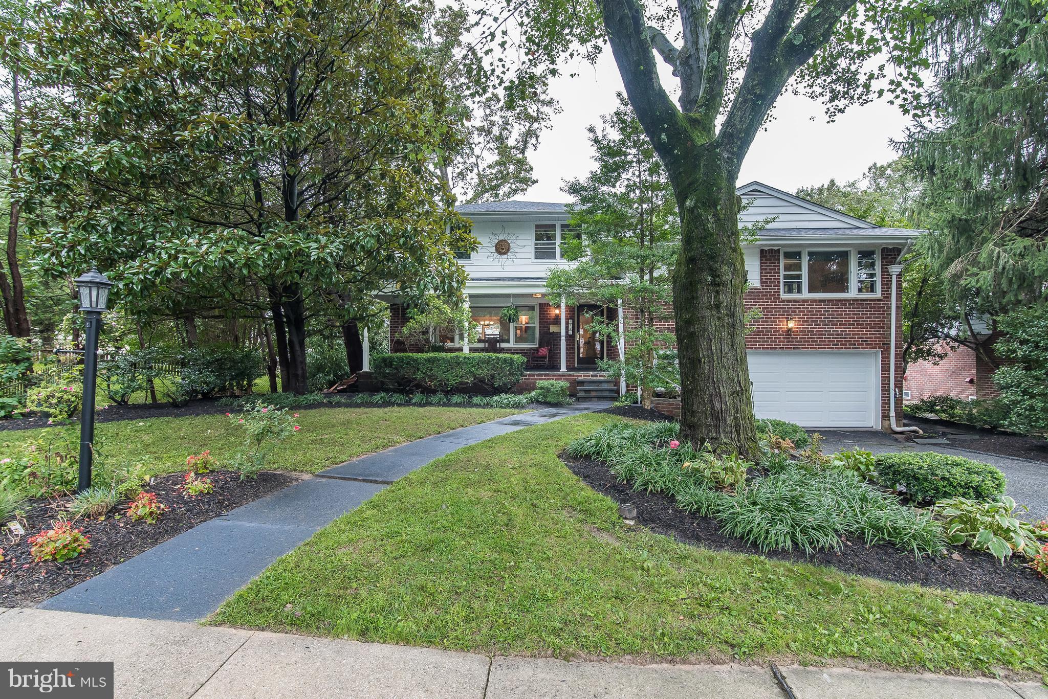 6116 Haddon Hall Road Baltimore, MD 21212 - Photo 1 of 44 a front view of a house with a yard