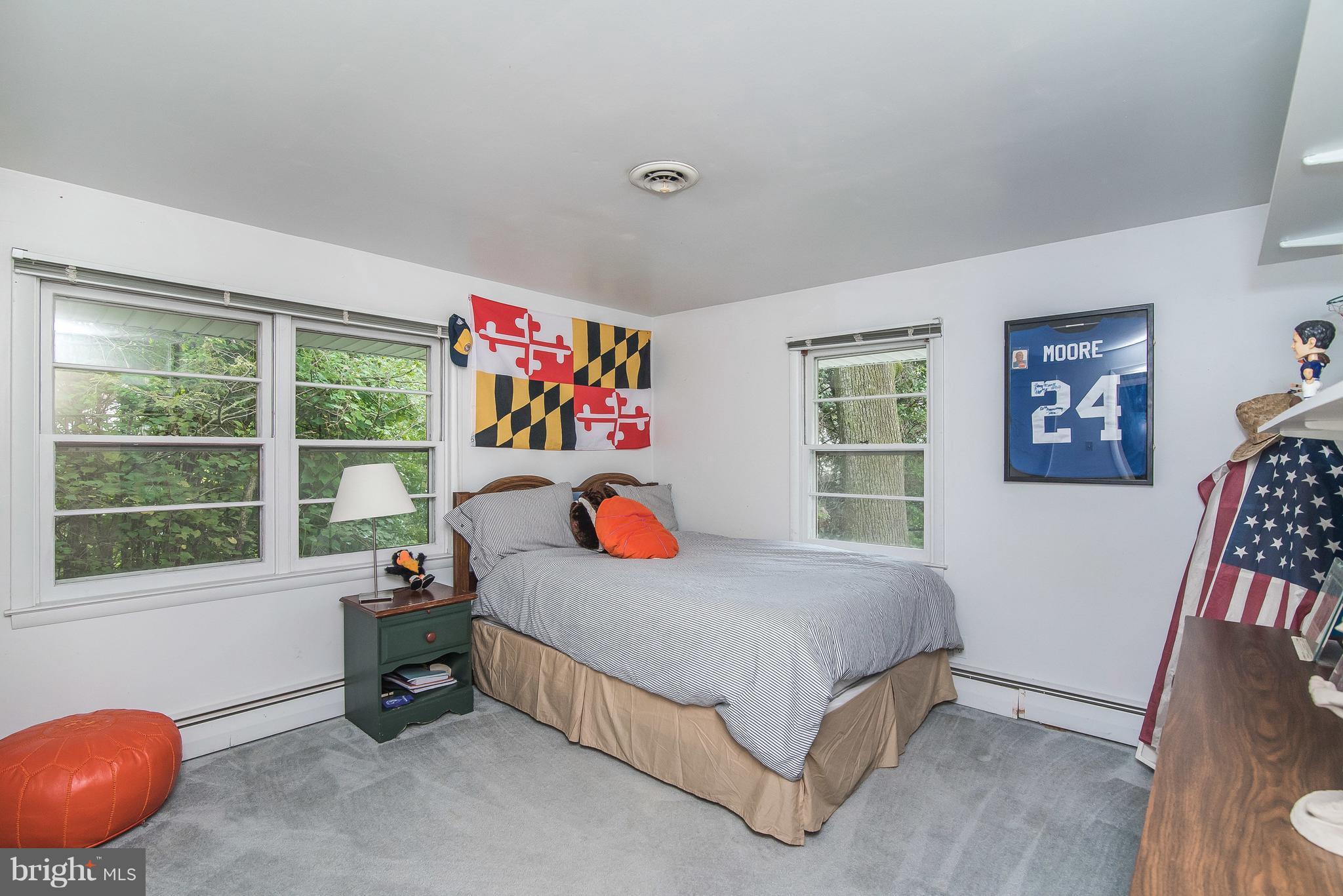 6116 Haddon Hall Road Baltimore, MD 21212 - Photo 25 of 44 a bedroom with a bed and a window