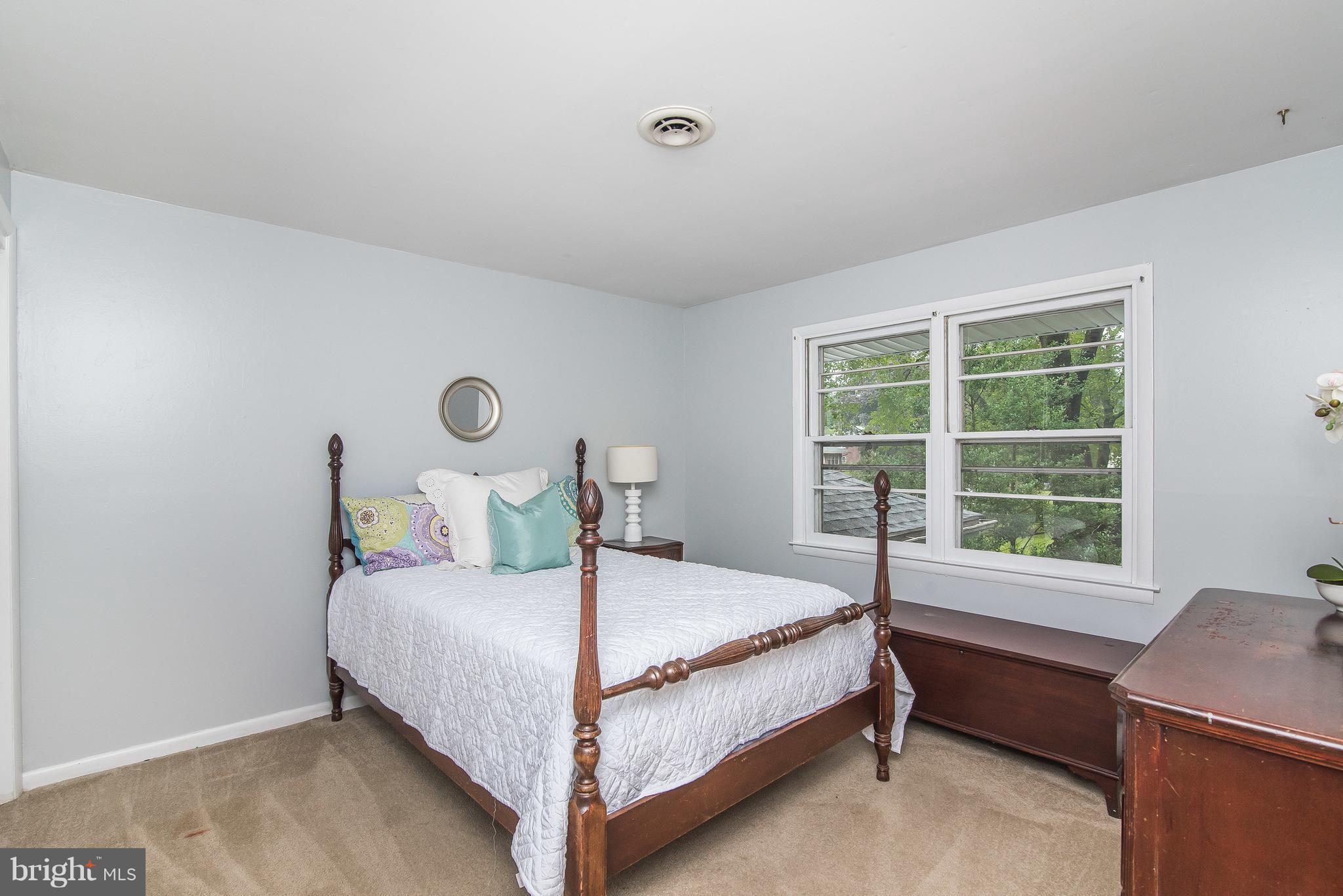 6116 Haddon Hall Road Baltimore, MD 21212 - Photo 26 of 44 a bedroom with a bed and a window