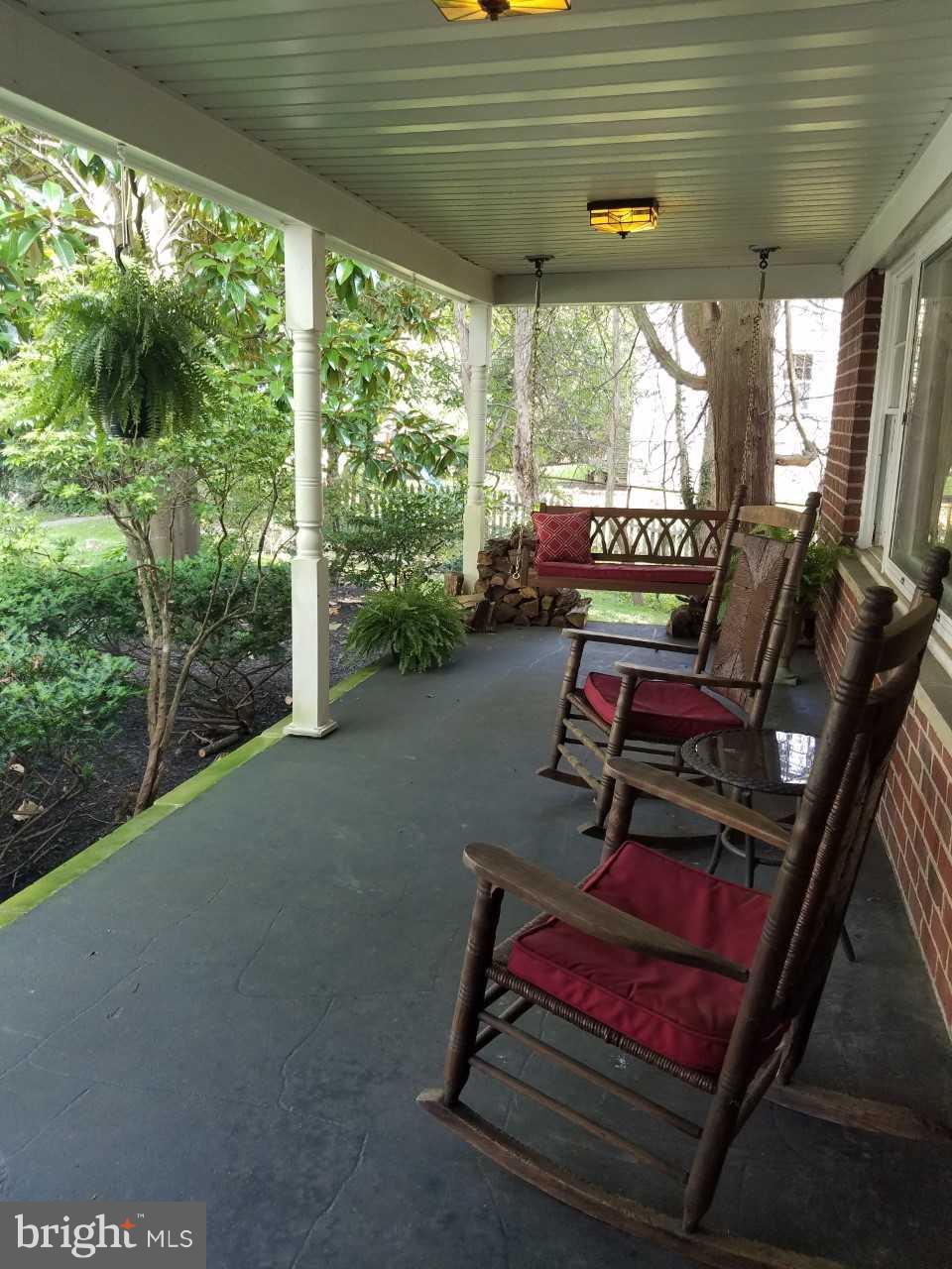 6116 Haddon Hall Road Baltimore, MD 21212 - Photo 4 of 44 a sitting area with furniture and outdoor view