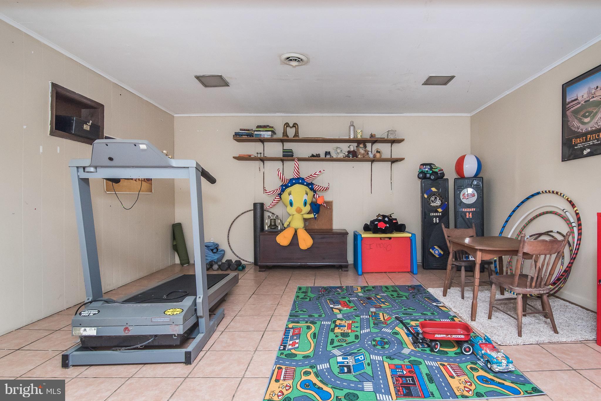 6116 Haddon Hall Road Baltimore, MD 21212 - Photo 31 of 44 a room with musical instruments and air hockey table