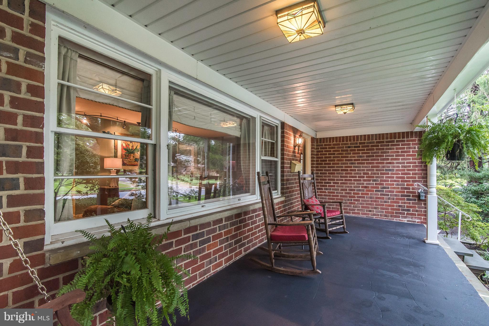 6116 Haddon Hall Road Baltimore, MD 21212 - Photo 5 of 44 a building outdoor space with patio furniture