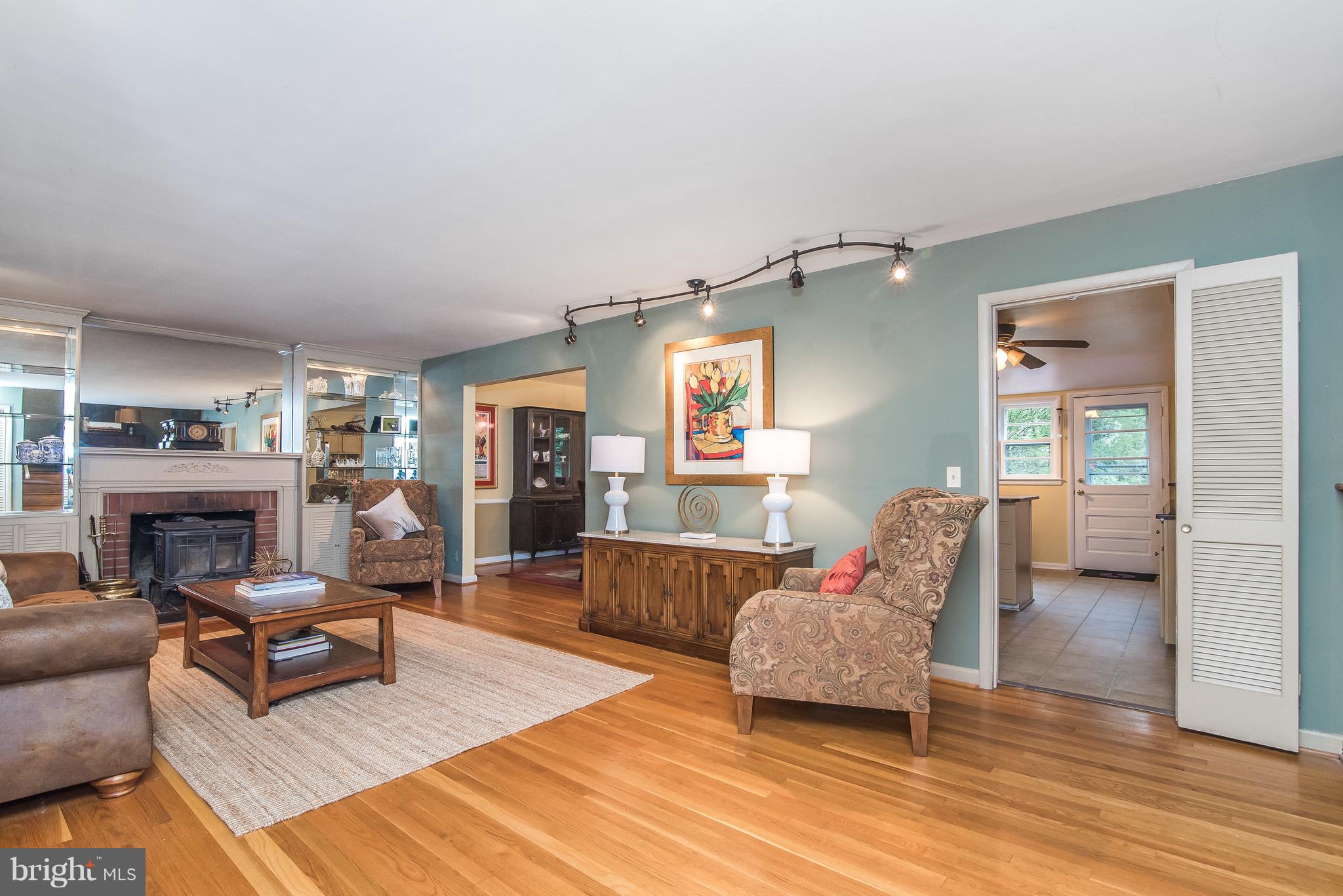 6116 Haddon Hall Road Baltimore, MD 21212 - Photo 6 of 44 a living room with furniture and a fireplace