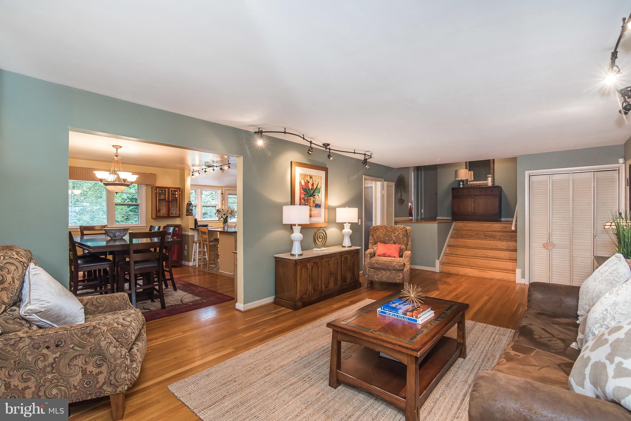 6116 Haddon Hall Road Baltimore, MD 21212 - Photo 10 of 44 a living room with furniture and a wooden floor