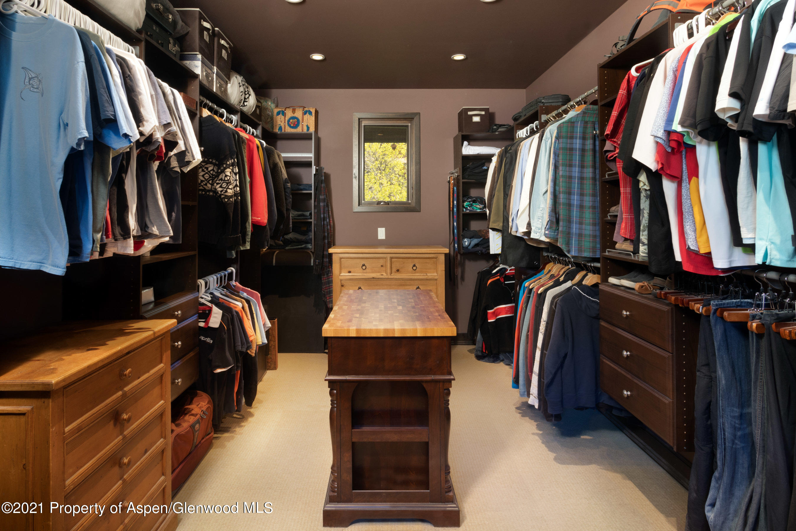 4559 Frying Pan Road Basalt, CO 81621 - Photo 19 of 35 a view of walk in closet with clothes and shoes