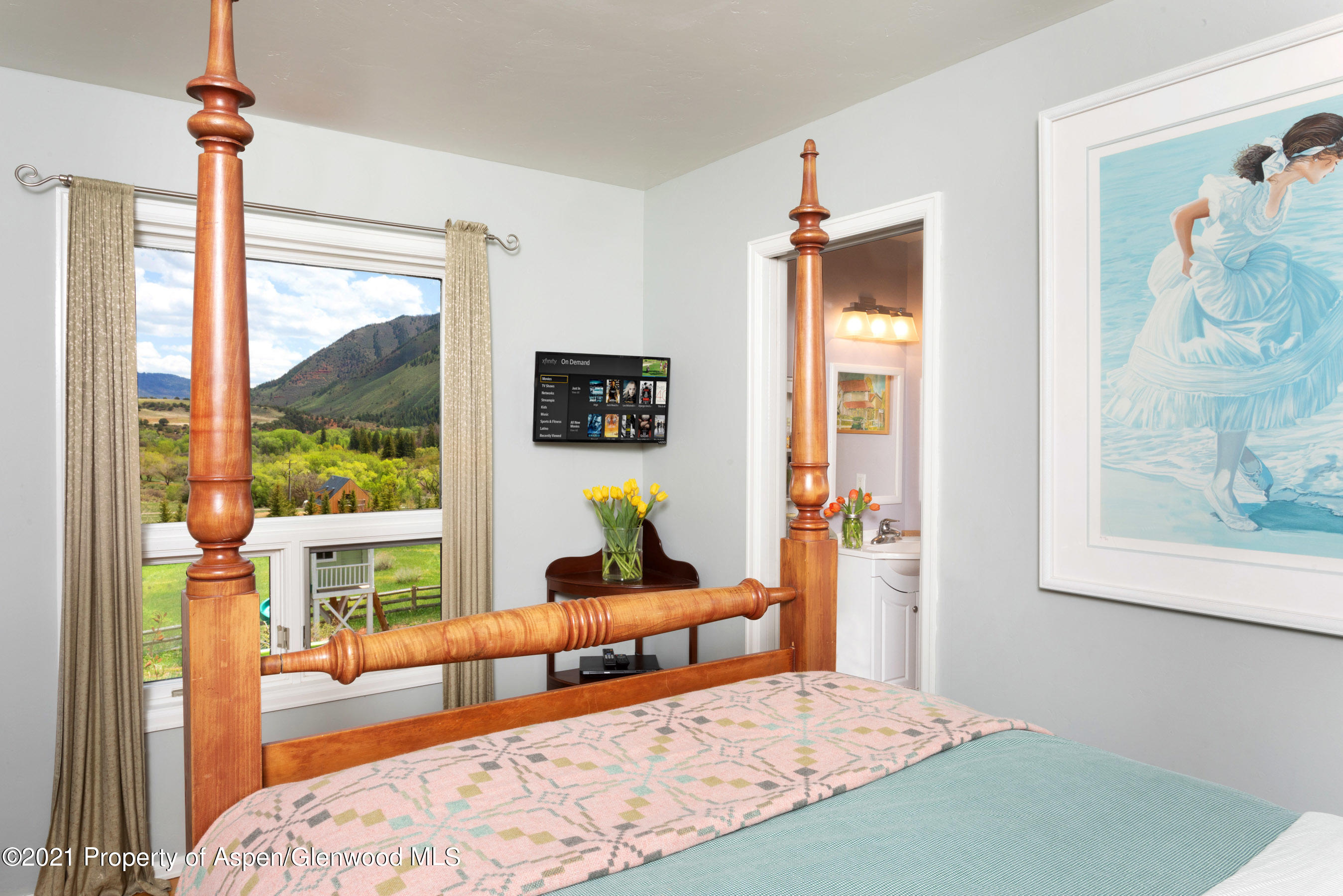 4559 Frying Pan Road Basalt, CO 81621 - Photo 20 of 35 a bedroom with furniture and a large window