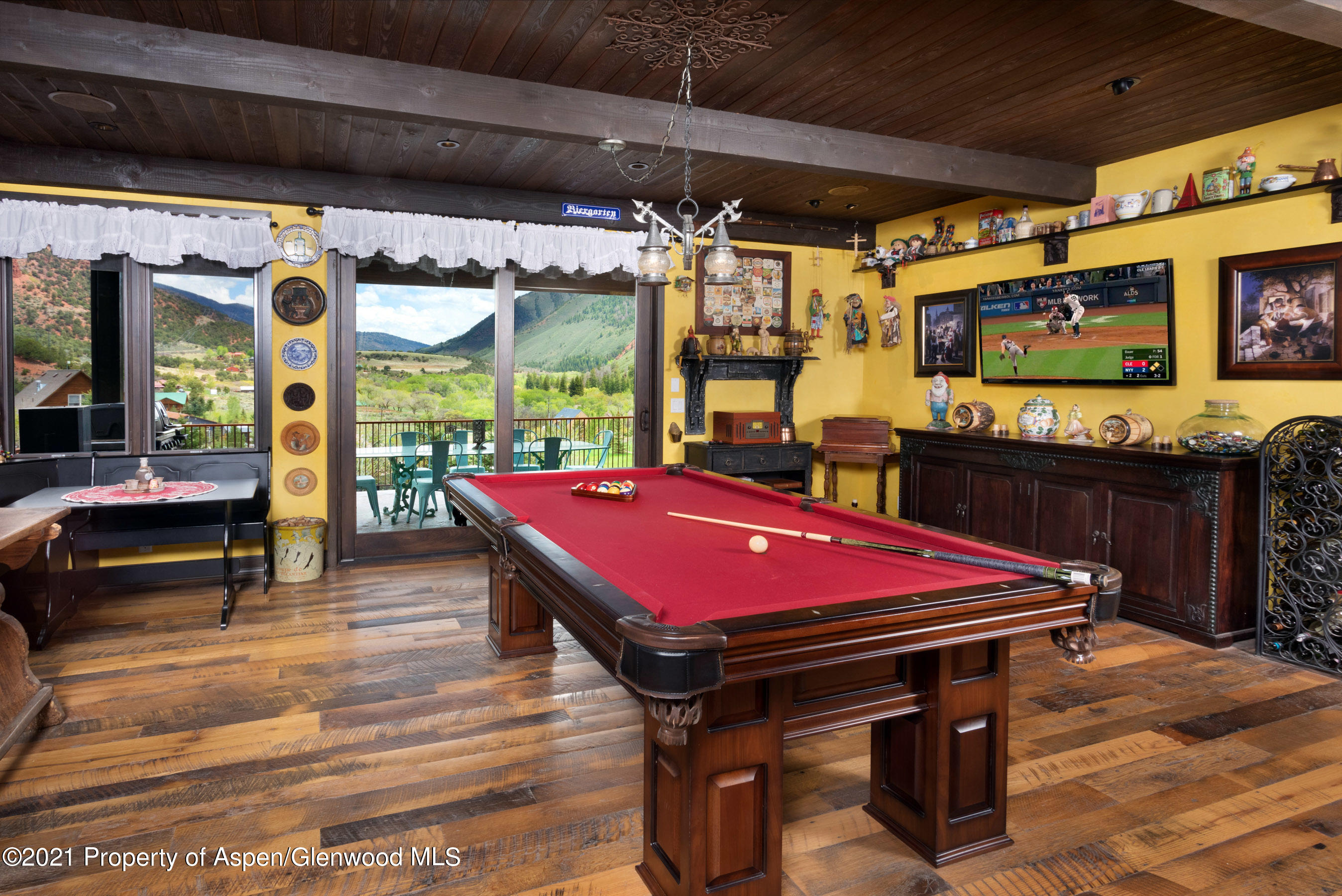4559 Frying Pan Road Basalt, CO 81621 - Photo 2 of 35 a patio with a table and chairs