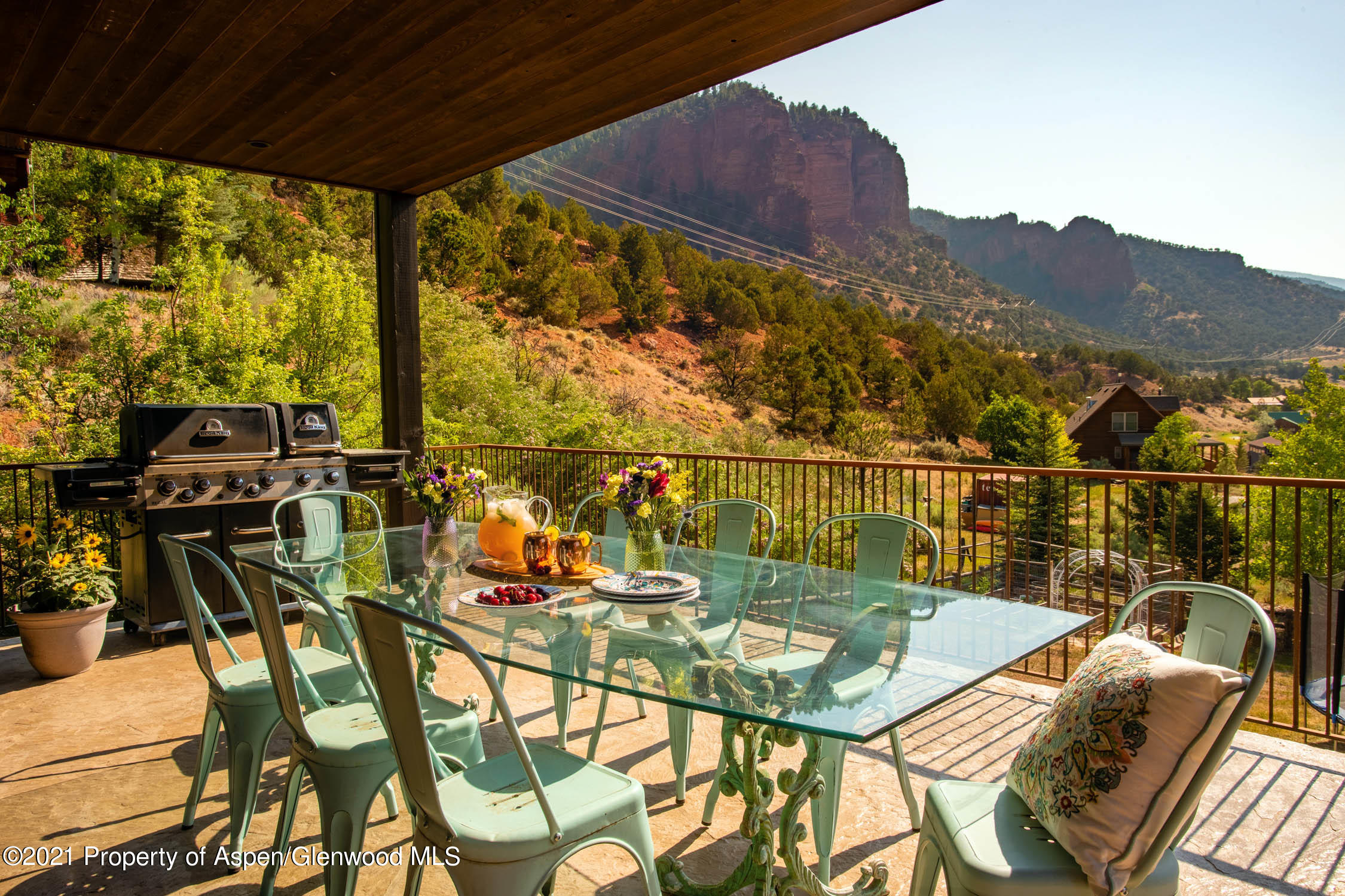 4559 Frying Pan Road Basalt, CO 81621 - Photo 26 of 35 a view of a balcony with chairs and wooden floor