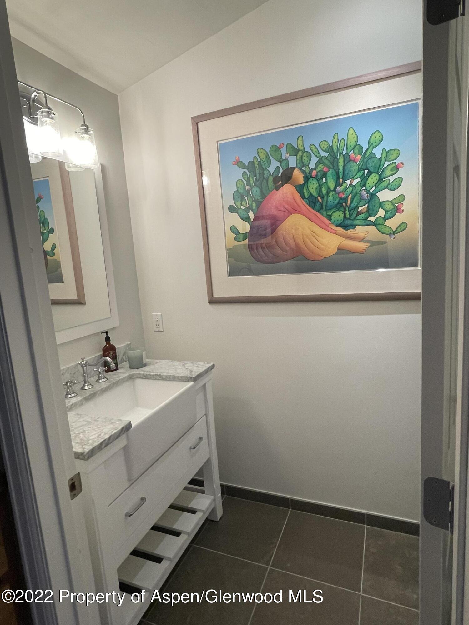 4559 Frying Pan Road Basalt, CO 81621 - Photo 28 of 35 a bathroom with a sink and a mirror