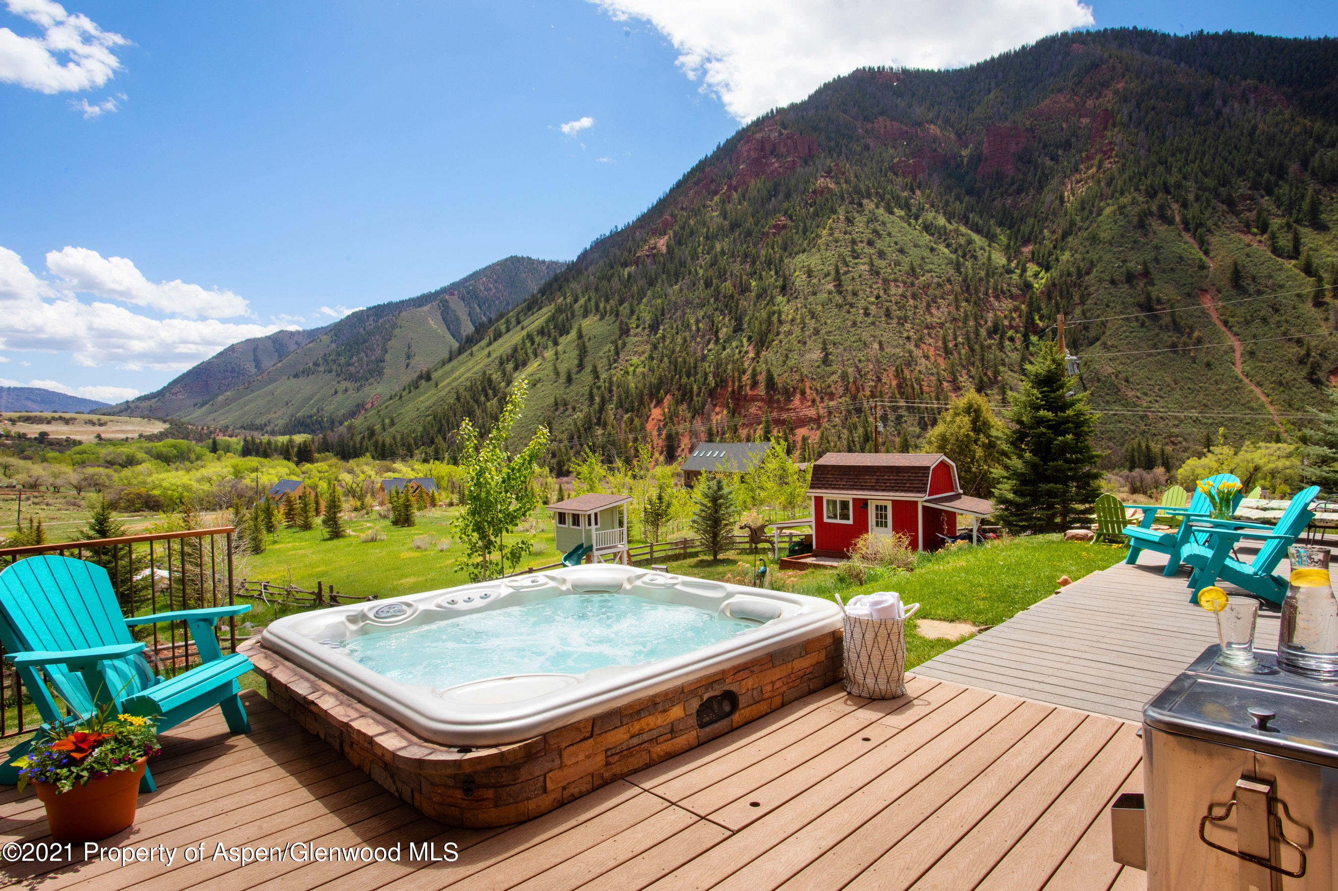 4559 Frying Pan Road Basalt, CO 81621 - Photo 3 of 35 a view of a patio with chairs and a table