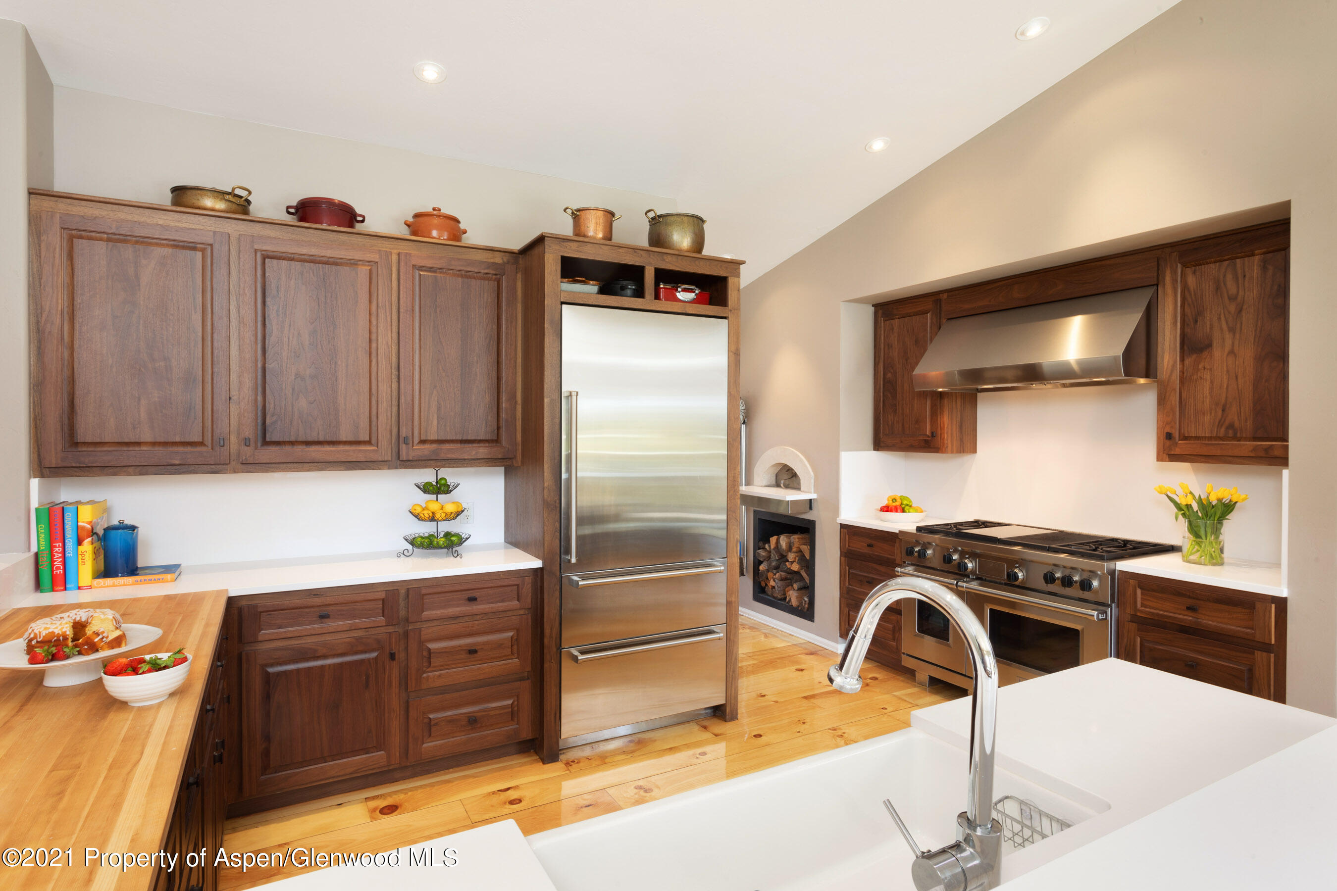 4559 Frying Pan Road Basalt, CO 81621 - Photo 6 of 35 a kitchen with stainless steel appliances kitchen island granite countertop a sink and cabinets