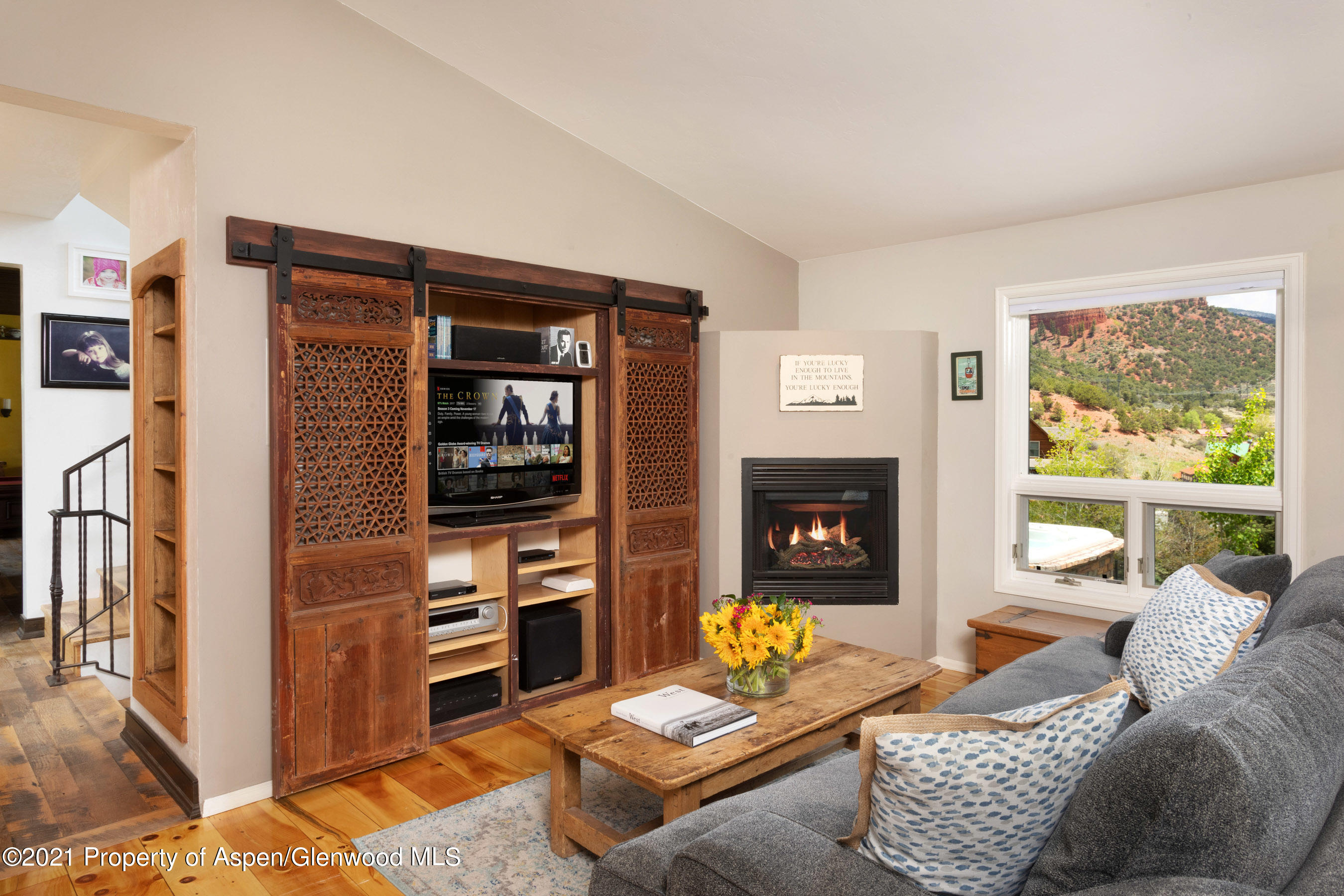 4559 Frying Pan Road Basalt, CO 81621 - Photo 10 of 35 a living room with furniture and a flat screen tv