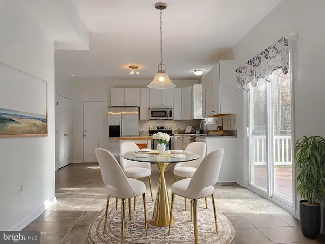 a view of a hallway with windows