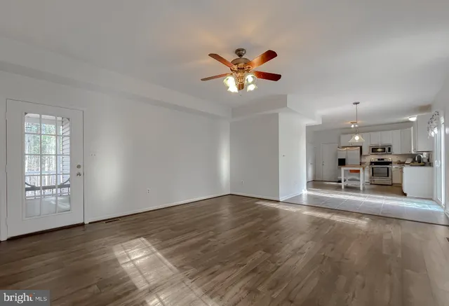 a bathroom with a tub a sink and a shower