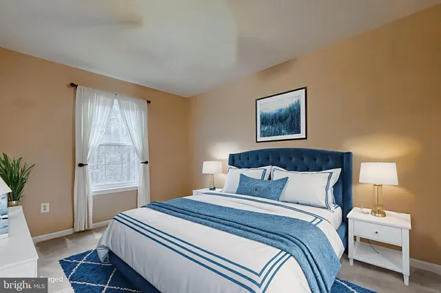 a view of a wooden deck with a yard and wooden fence