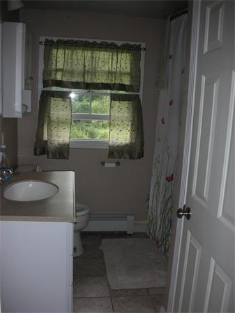 95 Brookfield Road Charlton, MA 01507 - Photo 13 of 15 a bathroom with a sink toilet and shower