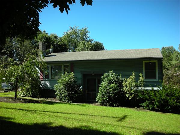 95 Brookfield Road Charlton, MA 01507 - Photo 3 of 15 a front view of a house with a garden