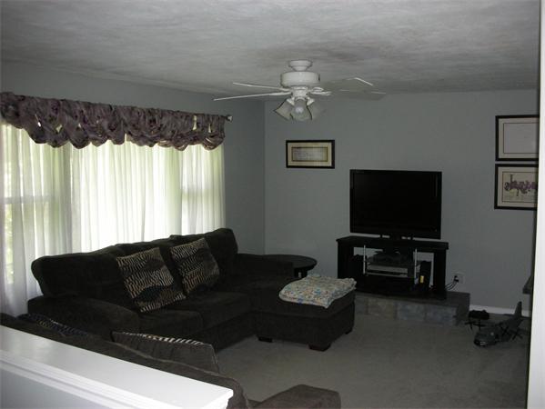 95 Brookfield Road Charlton, MA 01507 - Photo 7 of 15 a living room with furniture and a flat screen tv