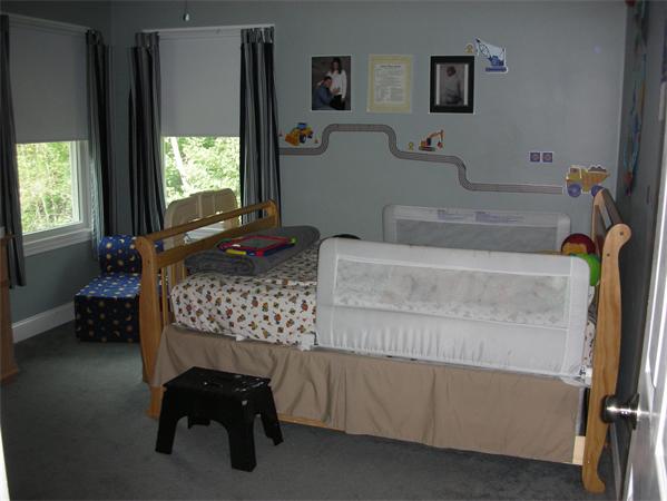 95 Brookfield Road Charlton, MA 01507 - Photo 9 of 15 a bedroom with a bed and a window