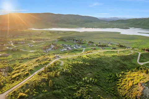 a view of an ocean and a mountain
