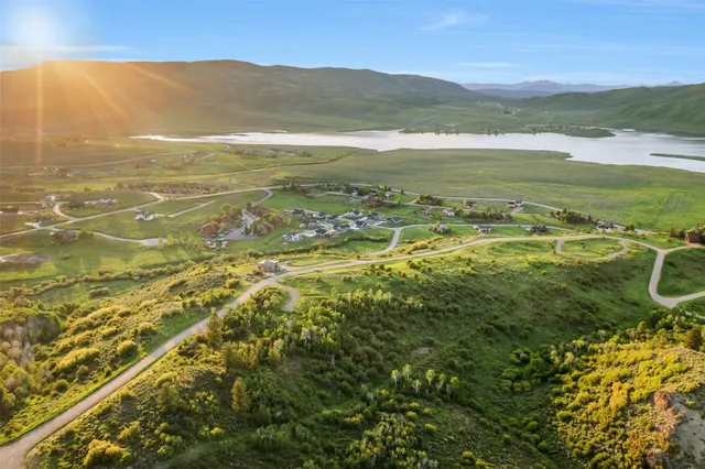 a view of an ocean and a mountain