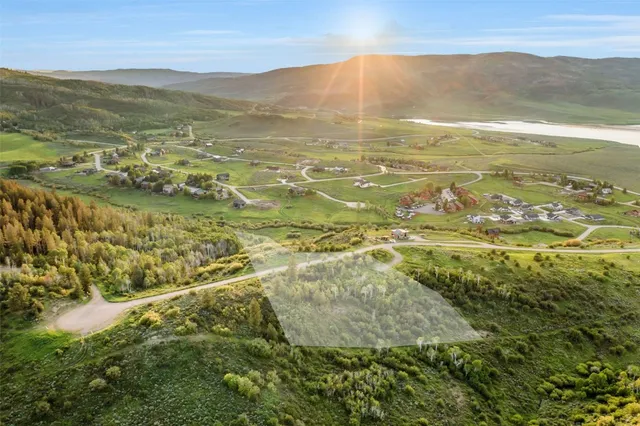 a view of an ocean and a mountain