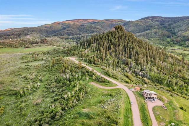 a view of mountain view with mountains in the background