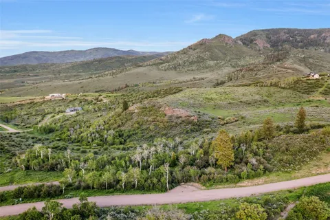 a view of a road with a yard