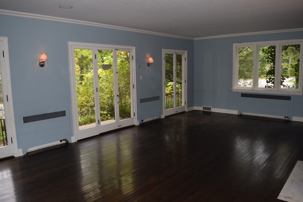 341 Scottswood Road Riverside, IL 60546 - Photo 17 of 46 an empty room with wooden floor and windows