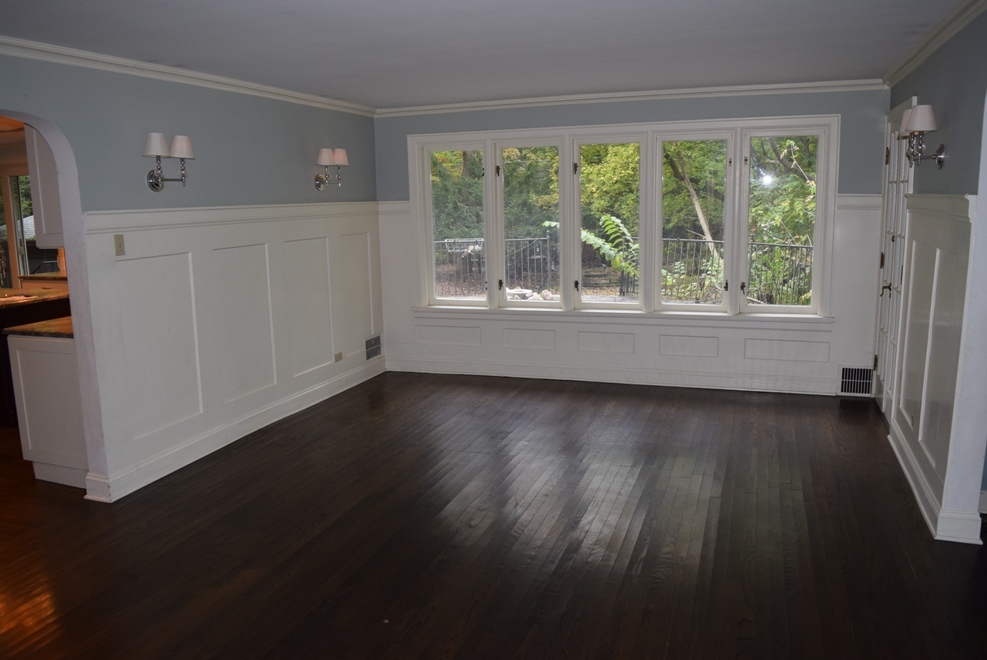 341 Scottswood Road Riverside, IL 60546 - Photo 18 of 46 an empty room with wooden floor and windows