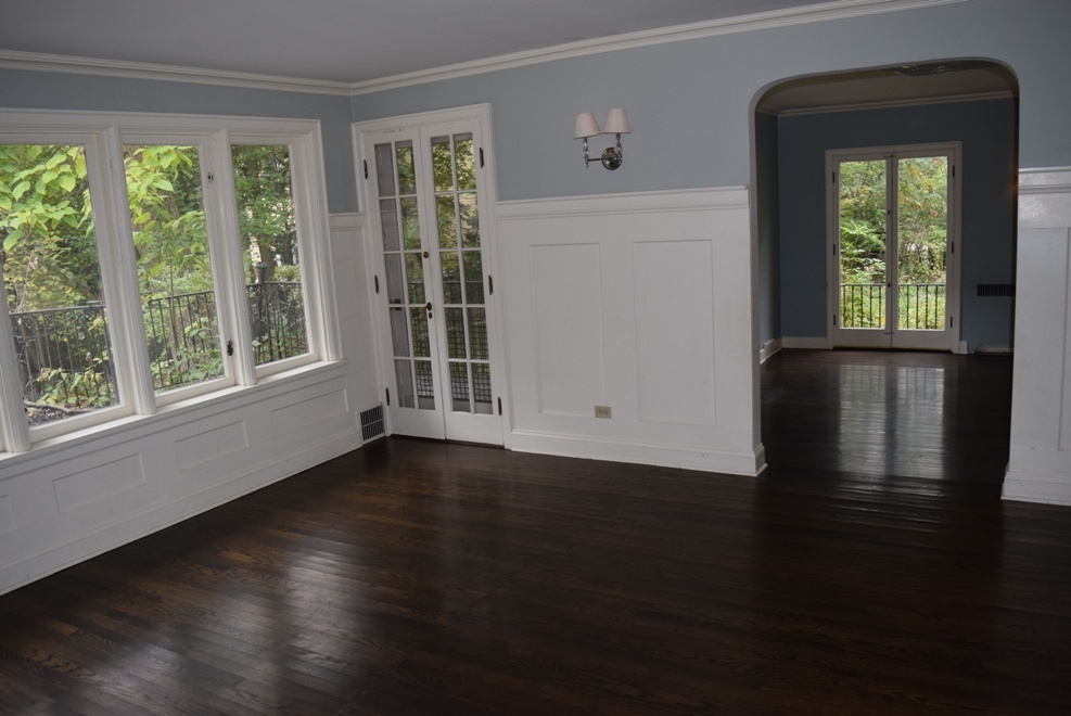 341 Scottswood Road Riverside, IL 60546 - Photo 19 of 46 an empty room with wooden floor and windows