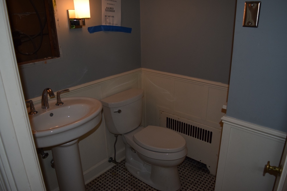 341 Scottswood Road Riverside, IL 60546 - Photo 21 of 46 a bathroom with a sink and a toilet
