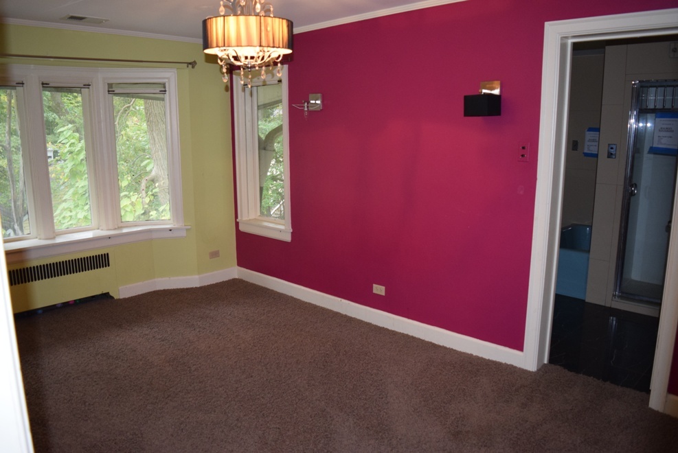 341 Scottswood Road Riverside, IL 60546 - Photo 25 of 46 a view of empty room with window
