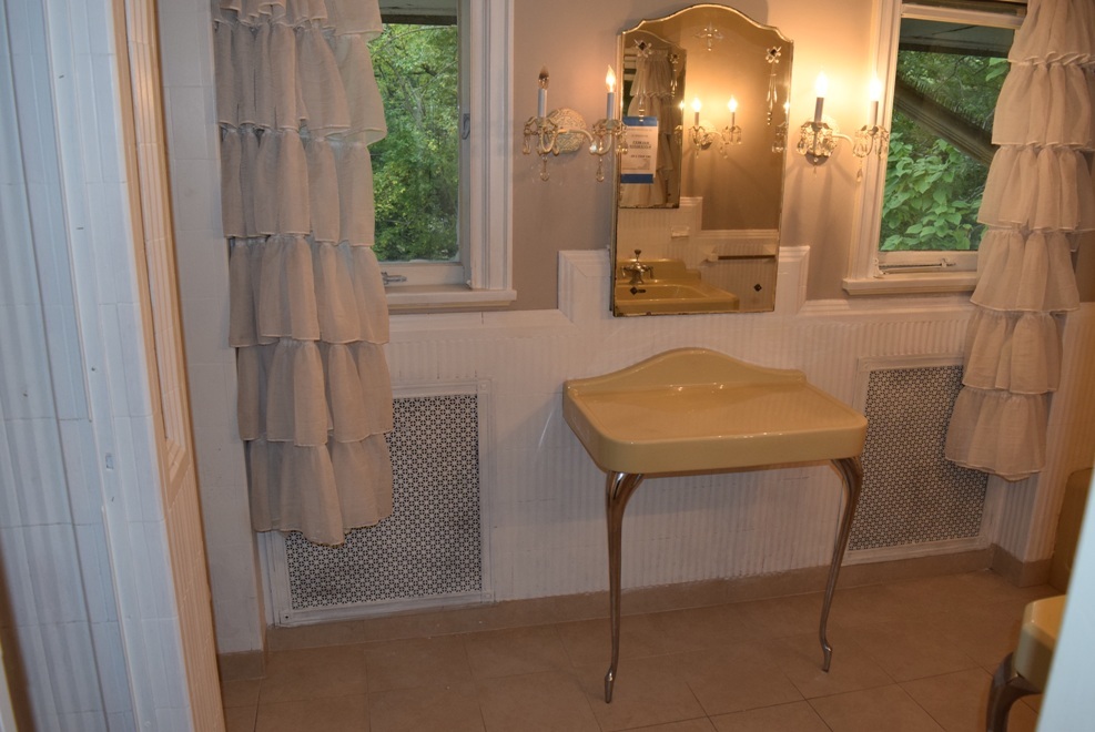 341 Scottswood Road Riverside, IL 60546 - Photo 26 of 46 a bathroom with a sink a mirror and a shower