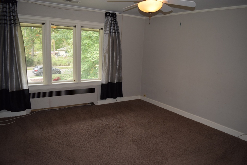 341 Scottswood Road Riverside, IL 60546 - Photo 28 of 46 a view of an empty room with a window